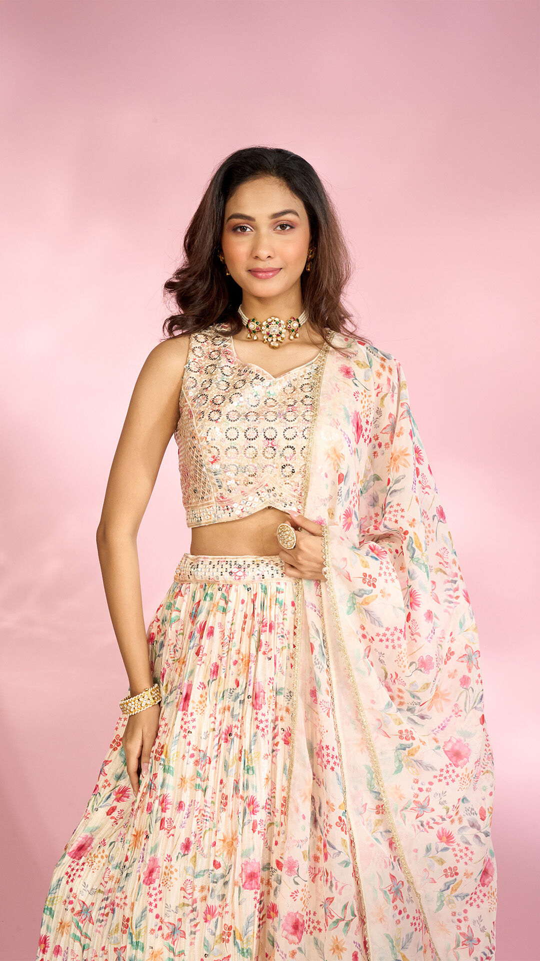 A woman wearing a beautiful floral lehenga choli for Navratri, a perfect festive outfit.